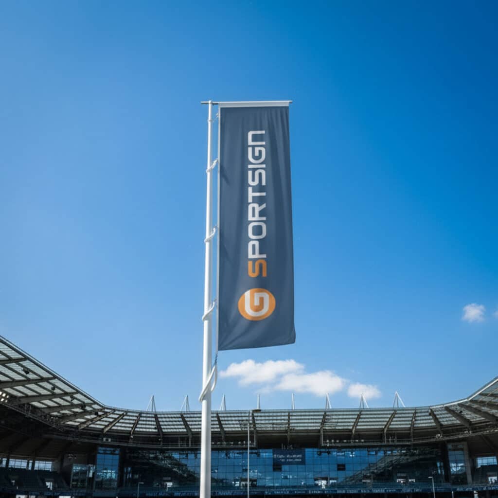 Drapeau sportif personnalisé aux couleurs d’un club, imprimé sur textile et prêt pour une utilisation en tribune ou en animation.